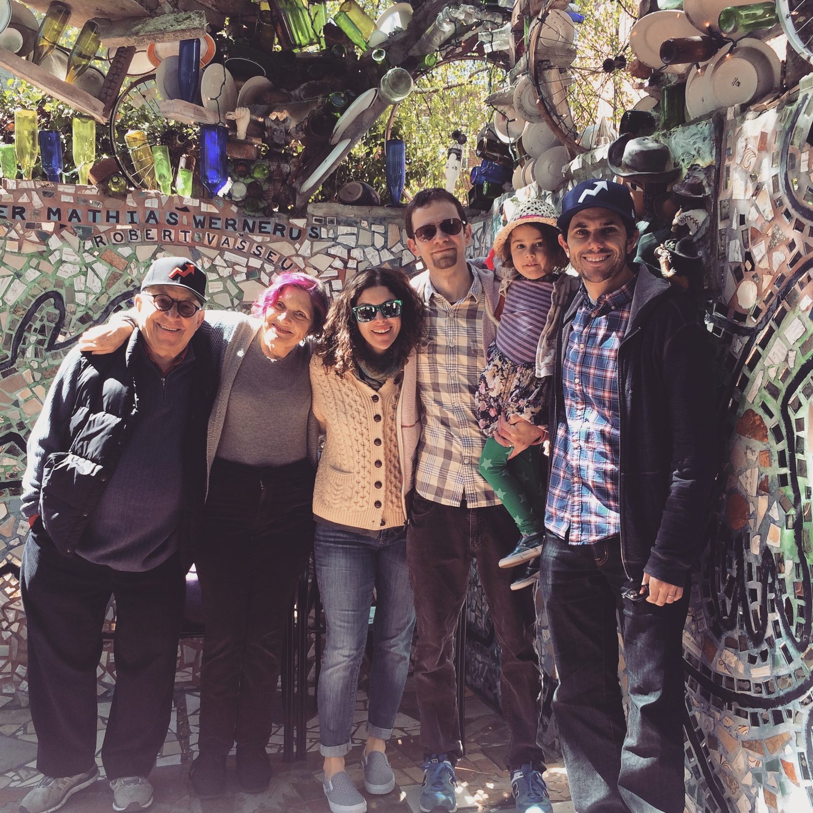 David with family in a mosaic garden